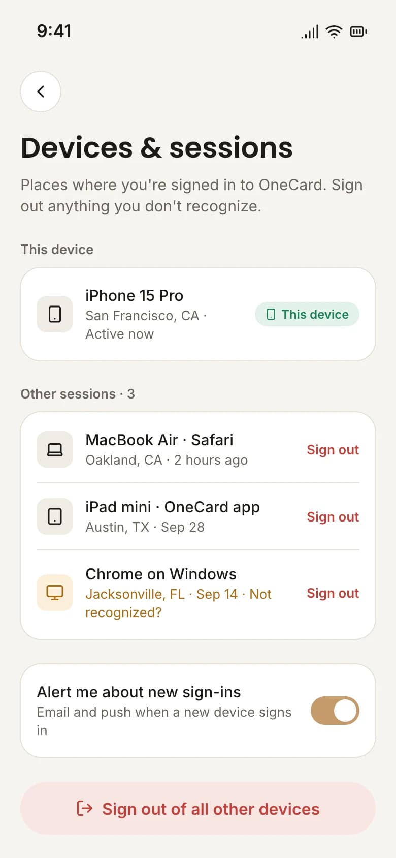 The OneCard app listing devices signed in to an account, with an unrecognized session flagged
